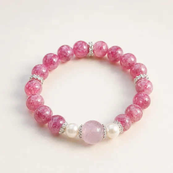Rose quartz and shell pearl, spaced with silver.